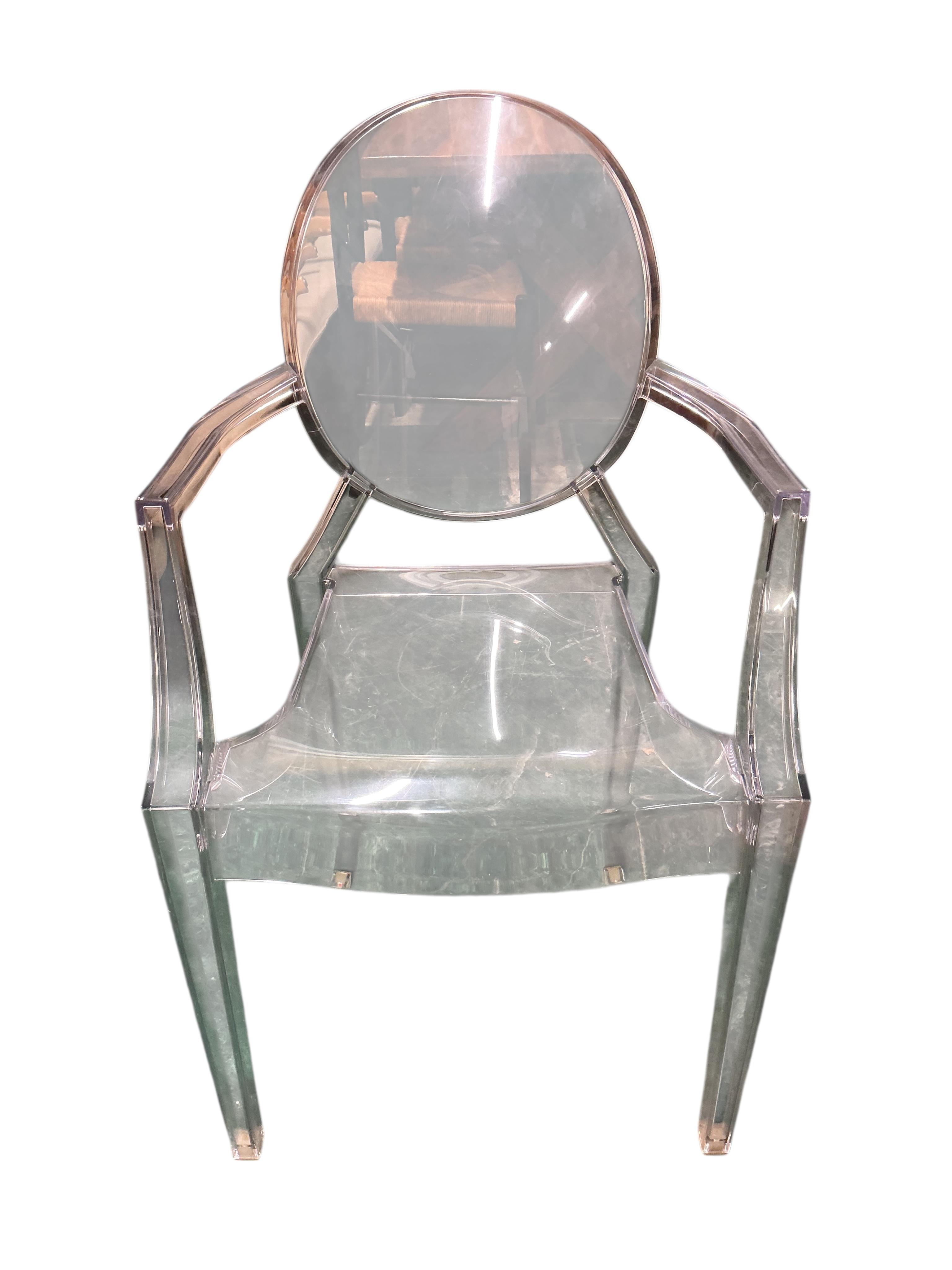 Three Philippe Stark Louis Ghost chairs by Kartell, width 54cm, depth 50cm, height 98cm